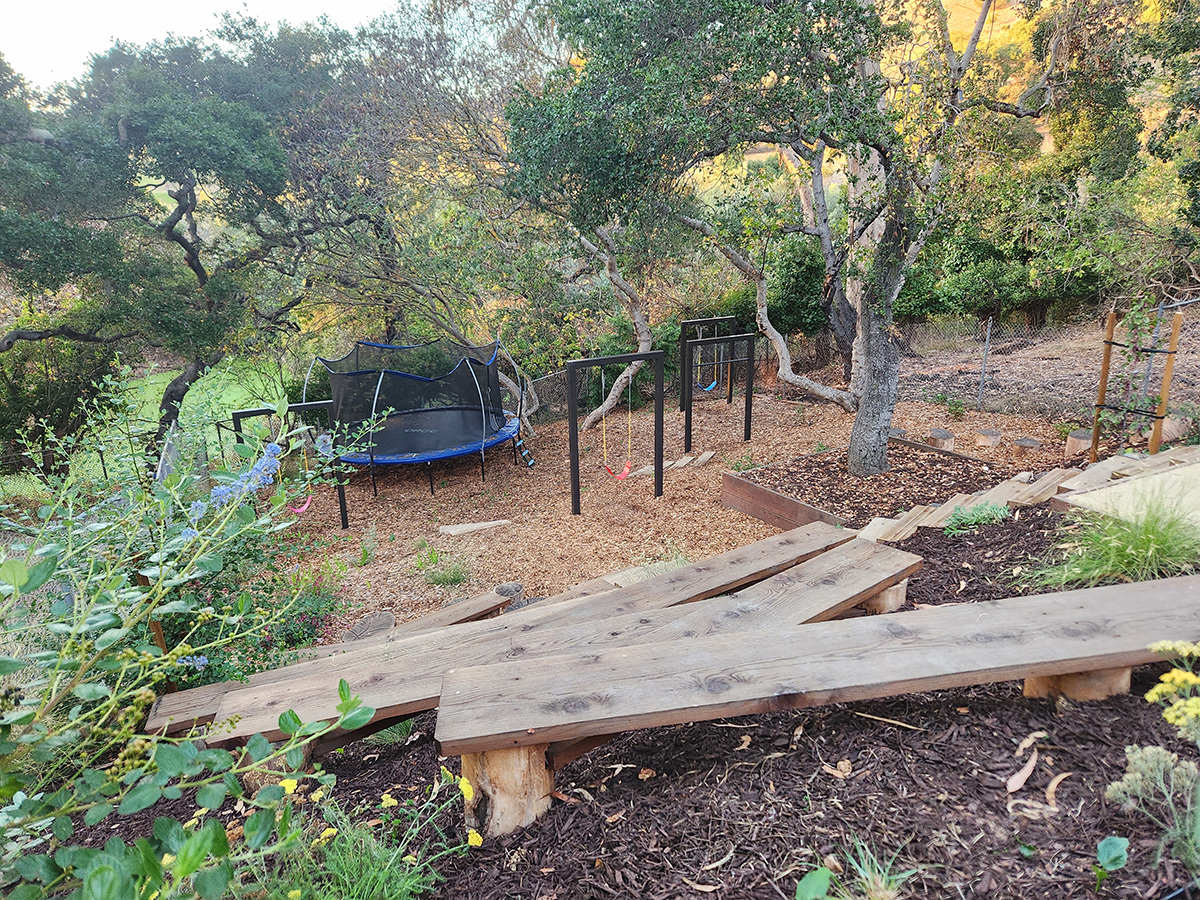Oakland Piedmont Garden Design Sloped Hillside Adventure Outdoor Playground Young Kids Stumps Swings Soccer Dining Family Backyard Native Plants