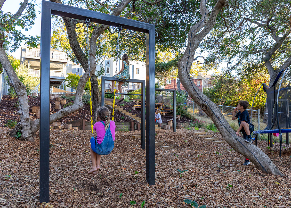 Oakland Piedmont Garden Design Sloped Hillside Adventure Outdoor Playground Young Kids Stumps Swings Soccer Dining Family Backyard Native Plants
