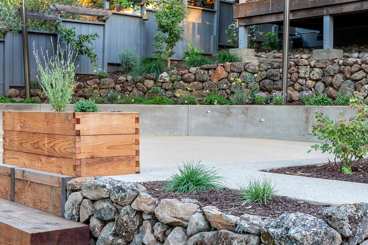 Oakland Piedmont Garden Design Sloped Hillside Adventure Outdoor Playground Young Kids Stumps Swings Soccer Dining Family Backyard Native Plants