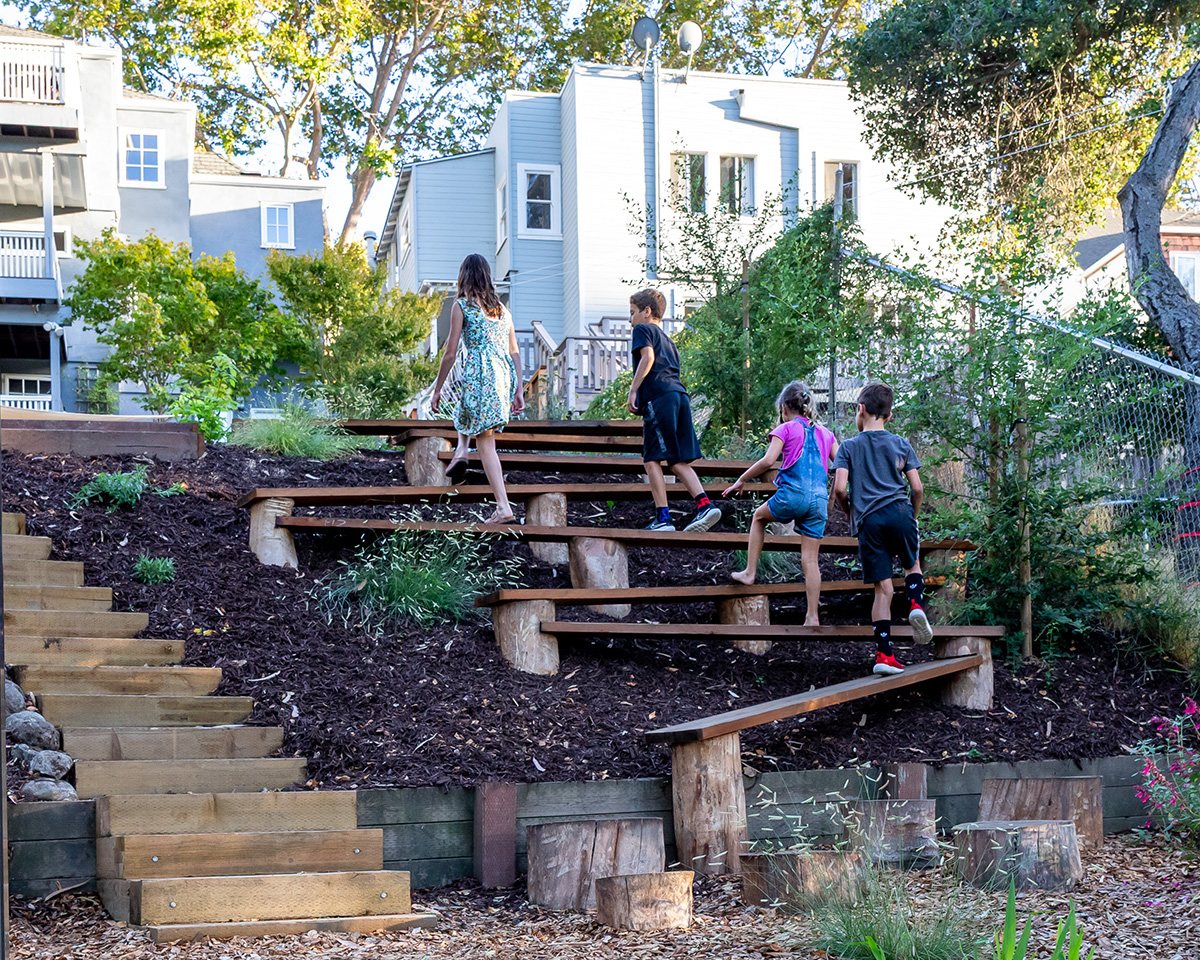 Oakland Piedmont Garden Design Sloped Hillside Adventure Outdoor Playground Young Kids Stumps Swings Soccer Dining Family Backyard Native Plants