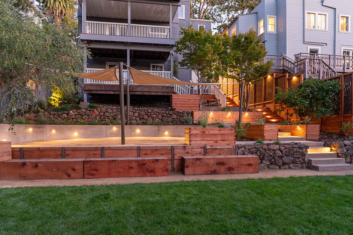 Oakland Piedmont Garden Design Sloped Hillside Adventure Outdoor Playground Young Kids Stumps Swings Soccer Dining Family Backyard Native Plants